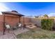 Patio with a fire pit and outdoor seating, creating a cozy ambiance in the backyard at 38208 N La Grange Ln, San Tan Valley, AZ 85140