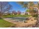 Well-maintained community basketball court surrounded by trees at 4226 E Spawn Ln, Gilbert, AZ 85296