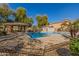 Inviting community pool with ample seating and well-maintained grounds at 4226 E Spawn Ln, Gilbert, AZ 85296