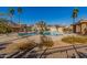 Resort-style community pool with lounge seating and shade at 4226 E Spawn Ln, Gilbert, AZ 85296