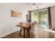 Bright dining area with wood floors, large sliding glass doors for easy access to outdoor at 4226 E Spawn Ln, Gilbert, AZ 85296