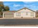 Charming single-story home featuring a two-car garage and neutral-toned stucco exterior at 4226 E Spawn Ln, Gilbert, AZ 85296