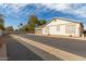 Charming single-story home featuring a two-car garage and neutral-toned stucco exterior at 4226 E Spawn Ln, Gilbert, AZ 85296