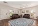 Bright living room with hardwood floors, neutral walls, and comfortable seating at 4226 E Spawn Ln, Gilbert, AZ 85296