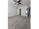 Bedroom featuring neutral carpet and paint, ceiling fan and closet at 4601 E Pollack Ln, Phoenix, AZ 85042