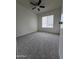 Carpeted bedroom with neutral colors and a ceiling fan at 4601 E Pollack Ln, Phoenix, AZ 85042