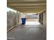 Covered patio with concrete floor overlooking an enclosed backyard at 4601 E Pollack Ln, Phoenix, AZ 85042