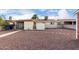 Wide backyard view showing the patio, shed, and gravel landscaping at 4626 W Mitchell Dr, Phoenix, AZ 85031