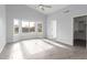 Main bedroom with a bay window, tile floors, and closet access at 5145 W Tonto Rd, Glendale, AZ 85308