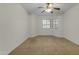 Comfortable bedroom featuring a ceiling fan and large windows at 5230 E Brown Rd # 110, Mesa, AZ 85205