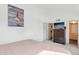 Serene bedroom with a spacious layout, wooden dresser, and subtle artwork, offering a peaceful escape at 5326 N 3Rd Ave, Phoenix, AZ 85013