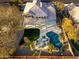 Aerial view of backyard featuring covered patio, pool and outdoor kitchen at 5433 E Nisbet Rd, Scottsdale, AZ 85254