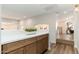 Hallway with a countertop and wooden cabinets and drawers at 5433 E Nisbet Rd, Scottsdale, AZ 85254