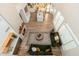 Open concept living room featuring fireplace, sofas, kitchen island and ample natural light at 5433 E Nisbet Rd, Scottsdale, AZ 85254