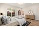 Bright main bedroom with ample natural light, neutral decor, and wood-look floors at 5433 E Nisbet Rd, Scottsdale, AZ 85254