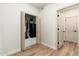 Spacious utility closet with a water heater and neutral-colored walls and flooring at 5433 E Nisbet Rd, Scottsdale, AZ 85254