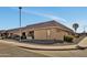 Corner lot exterior shot of a well-maintained single-story home with desert landscaping and clearly visible house number at 601 W Yukon Dr # 1, Phoenix, AZ 85027