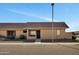 Cozy single-story home featuring desert landscaping, a tile roof, and the house number displayed above the front window at 601 W Yukon Dr # 1, Phoenix, AZ 85027