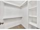 Spacious walk-in closet with built-in shelving and ample storage space at 601 W Yukon Dr # 1, Phoenix, AZ 85027