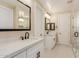 Stylish bathroom featuring double sink vanity, a separate toilet room and shower with decorative tile at 6223 S Eagle Pass Rd, Gold Canyon, AZ 85118