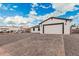 Charming single-story home featuring white siding, a gray roof, and a paved driveway at 6223 S Eagle Pass Rd, Gold Canyon, AZ 85118