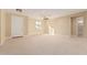 Spacious living room featuring light beige walls and tile flooring at 6223 S Eagle Pass Rd, Gold Canyon, AZ 85118