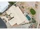 Aerial view of a desert home with a backyard pool, patios, desert landscaping, and neutral roof at 6460 E Trailridge Cir # 2, Mesa, AZ 85215