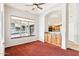 Bright dining area featuring built-in cabinets and natural light, seamlessly flowing into the kitchen at 6460 E Trailridge Cir # 2, Mesa, AZ 85215