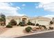 Beautiful single-story home featuring a circular driveway and well-maintained desert landscaping at 6460 E Trailridge Cir # 2, Mesa, AZ 85215