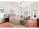 Staged primary bedroom featuring large windows and neutral color scheme at 6460 E Trailridge Cir # 2, Mesa, AZ 85215