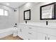 Elegant bathroom with double vanity, modern fixtures, and marble tiled shower at 7113 E Bell Cir, Mesa, AZ 85208