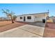 Charming single-story home with a carport, well-maintained exterior, and desert landscaping at 7113 E Bell Cir, Mesa, AZ 85208