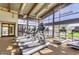 Community fitness center with treadmills, weights, and a beautiful view of the water at 7337 S Debra Dr, Gilbert, AZ 85298