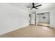 Bedroom with mirrored closet doors, tile flooring, and ceiling fan at 7458 E Clovis Cir, Mesa, AZ 85208