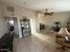 Bright living room features tile floors, ceiling fan, and a comfortable atmosphere at 8610 N 37Th Ave, Phoenix, AZ 85051