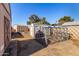 This backyard has multiple storage sheds, garden beds and a chicken coop at 8612 N 31St Ln, Phoenix, AZ 85051