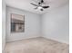 A bedroom with a ceiling fan and light colored wood look floors at 8826 W Amelia Ave, Phoenix, AZ 85037