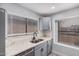 Updated kitchen with stainless appliances, a modern sink and faucet, and white countertops at 8826 W Amelia Ave, Phoenix, AZ 85037