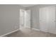 Bedroom with closet and view of a pantry and storage at 9734 W Carol Ave, Peoria, AZ 85345