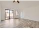 Bright, airy bedroom with sliding glass doors leading to an outdoor patio seating area at 10243 N 103Rd St, Scottsdale, AZ 85258