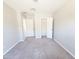 Cozy bedroom with carpet, walk-in closet and neutral walls at 1061 W Palo Verde Ave, Coolidge, AZ 85128