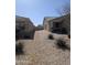 Side yard with gravel, desert plants, and a desert landscape at 1061 W Palo Verde Ave, Coolidge, AZ 85128