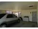 Spacious garage providing ample parking and storage space at 10612 N 102Nd Dr, Sun City, AZ 85351