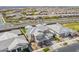 Gorgeous aerial view of a gray two-story home with a spacious yard in a desirable suburban neighborhood at 10635 E Tesla Ave, Mesa, AZ 85212