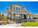 Lovely home with manicured landscaping, stone accents, and well-maintained curb appeal at 10635 E Tesla Ave, Mesa, AZ 85212