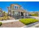 Charming two-story home with landscaped front yard and inviting curb appeal at 10635 E Tesla Ave, Mesa, AZ 85212