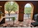 Inviting balcony with rustic wood-look flooring and stylish wrought-iron railings at 10655 N 9Th St # 204, Phoenix, AZ 85020