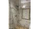 Elegant tiled shower enclosure with glass door and built-in niche at 10655 N 9Th St # 204, Phoenix, AZ 85020