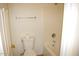 Cozy bathroom featuring a toilet, towel rack, and tiled shower/tub combo at 1083 E Jade Dr, Chandler, AZ 85286