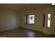 Living room with window showcasing a view of the neighborhood at 1083 E Jade Dr, Chandler, AZ 85286